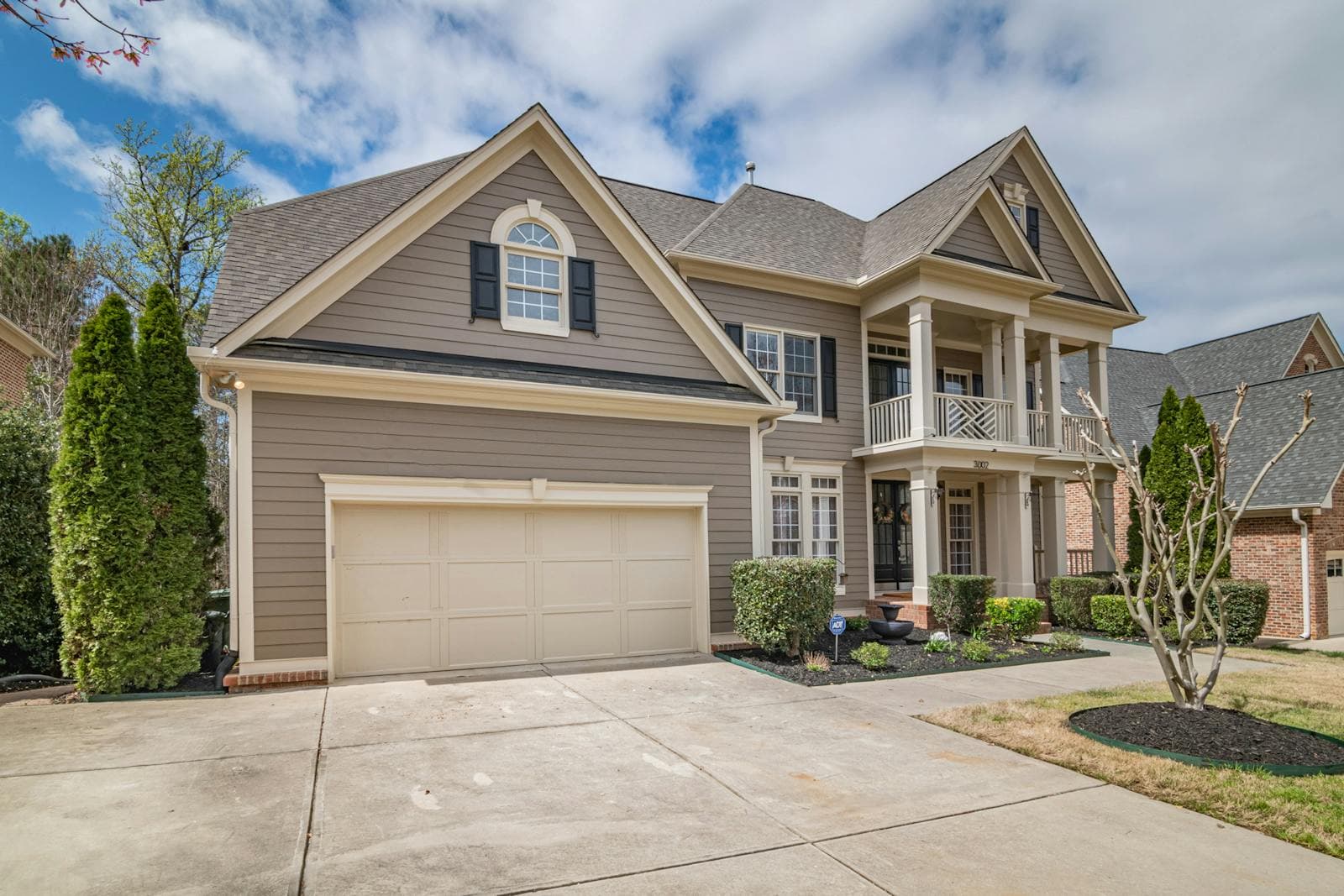 A modern Wildwood, MO home with a mature lot — typical of the upscale, wooded properties Roger's serves across 63005, 63011, 63021, 63038, and 63040.